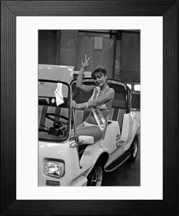 Framed Print : Model Joanne Latham sitting in an electric car. 13th March 1978 Framed Print : Model Joanne Latham sitting in an electric car. 13th March 1978