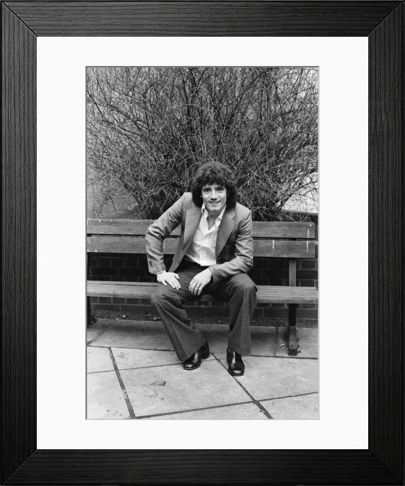 Framed Print : England footballer Kevin Keegan poses for photographers as he performs a joke for them Framed Print : England footballer Kevin Keegan poses for photographers as he performs a joke for them