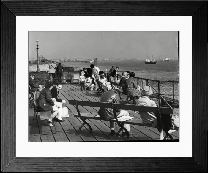 Framed Print : Even as a shadow of its former self, the Corporation Pier is still a popular sun-spot for Framed Print : Even as a shadow of its former self, the Corporation Pier is still a popular sun-spot for
