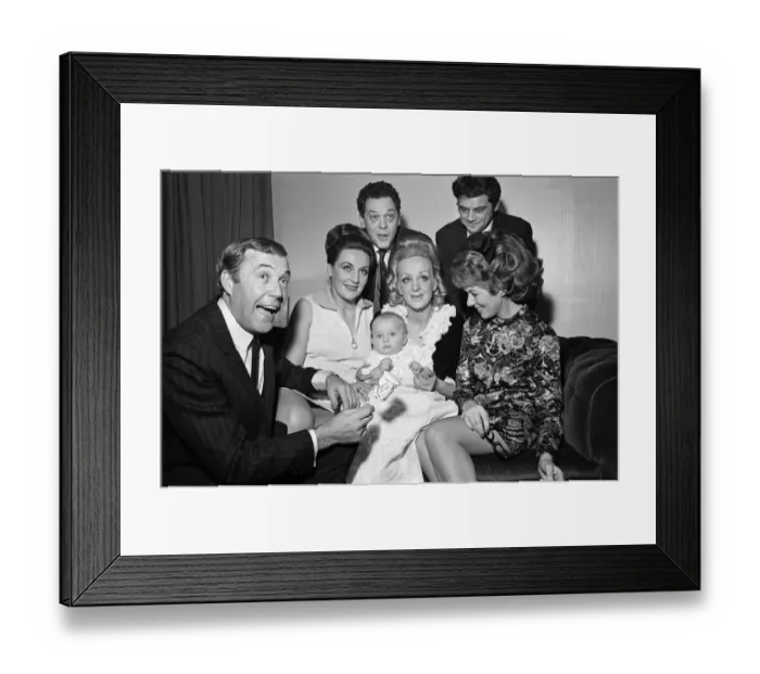 Framed Print : Val Doonican and his wife Lynn in supporting roles at the christening of baby Russell