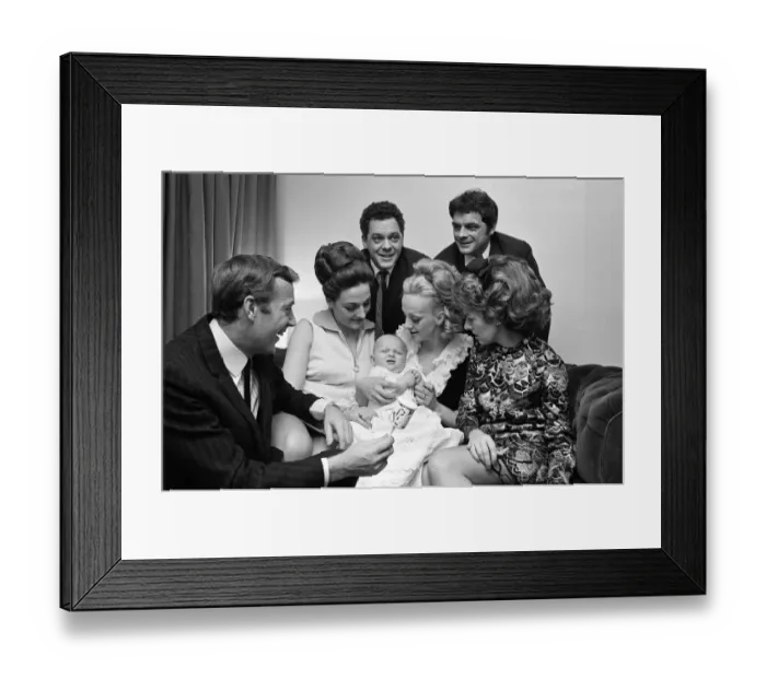 Framed Print : Val Doonican and his wife Lynn in supporting roles at the christening of baby Russell Framed Print : Val Doonican and his wife Lynn in supporting roles at the christening of baby Russell