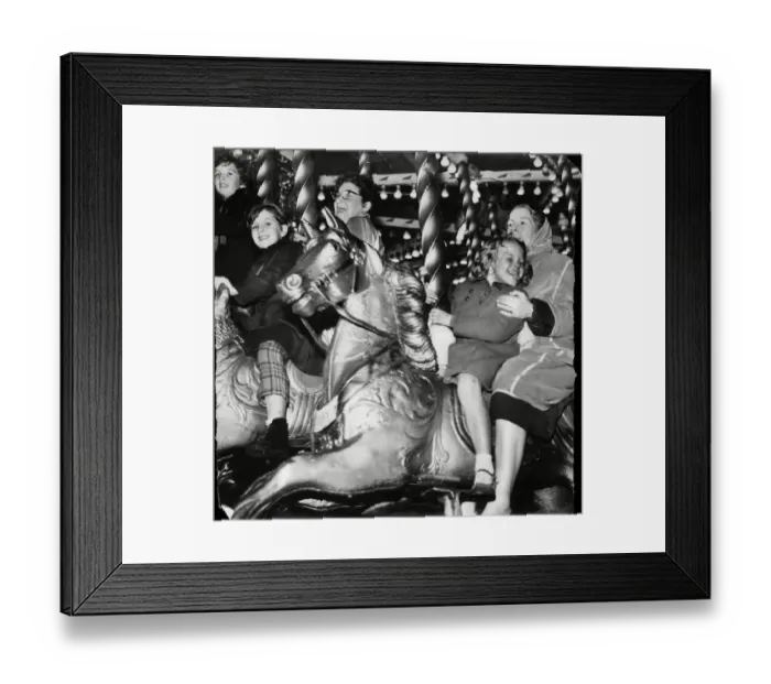 Framed Print : These galloping horses first started on their circular tour in the 1980 s