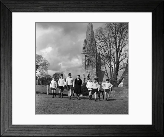 Framed Print : Scholars and choirboys of Llandaff Cathedral, South Wales, on their way to play rugby Framed Print : Scholars and choirboys of Llandaff Cathedral, South Wales, on their way to play rugby
