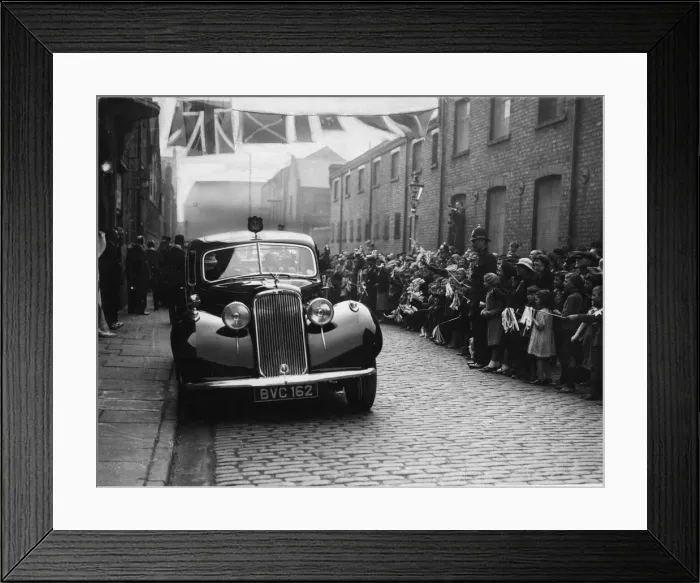 Framed Print : Local children wave their flags and cheer in Craven Street during the visit of the Duke Framed Print : Local children wave their flags and cheer in Craven Street during the visit of the Duke