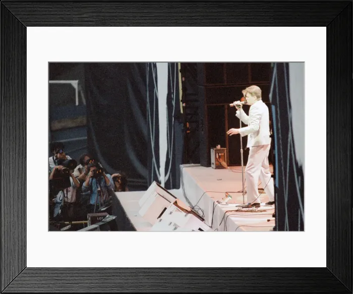 Framed Print : Live Aid concert held at Wembley Stadium, London to raise funds for relief of the ongoing Framed Print : Live Aid concert held at Wembley Stadium, London to raise funds for relief of the ongoing