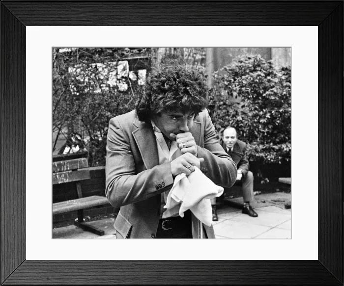 Framed Print : England footballer Kevin Keegan poses for photographers as he performs a joke for them Framed Print : England footballer Kevin Keegan poses for photographers as he performs a joke for them