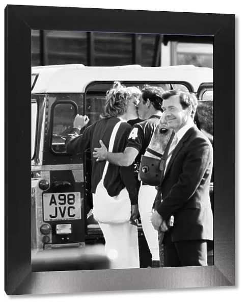 HRH The Princess of Wales, Princess Diana and Prince Charles have an affectionate kiss at