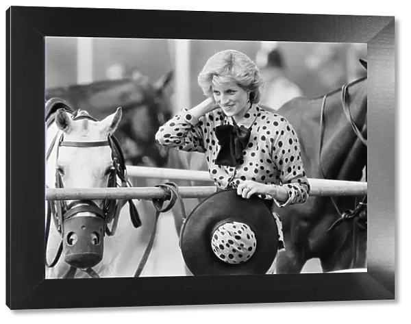 HRH The Princess of Wales, Princess Diana, watches Prince Charles playing Polo