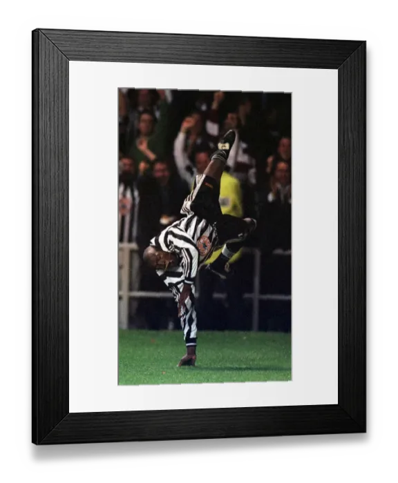 Framed Print : Faustino Asprilla Newcastle United September 1997 celebrates scoring during