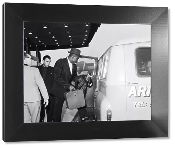 Sonny Liston, World Heavyweight Champion, pictured at London Heathrow Airport as he heads