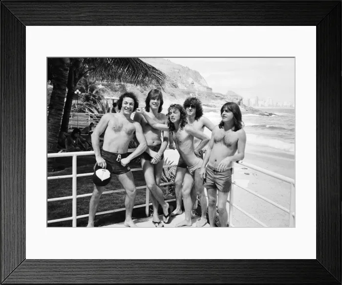 Framed Print : Australian rock group AC  /  DC takes time to relax at Ipanema beach in Rio De Janeiro