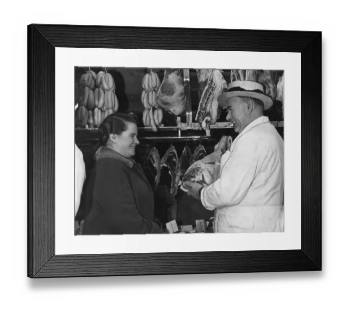 Framed Print : Woman at Butchers Shop, January 1962