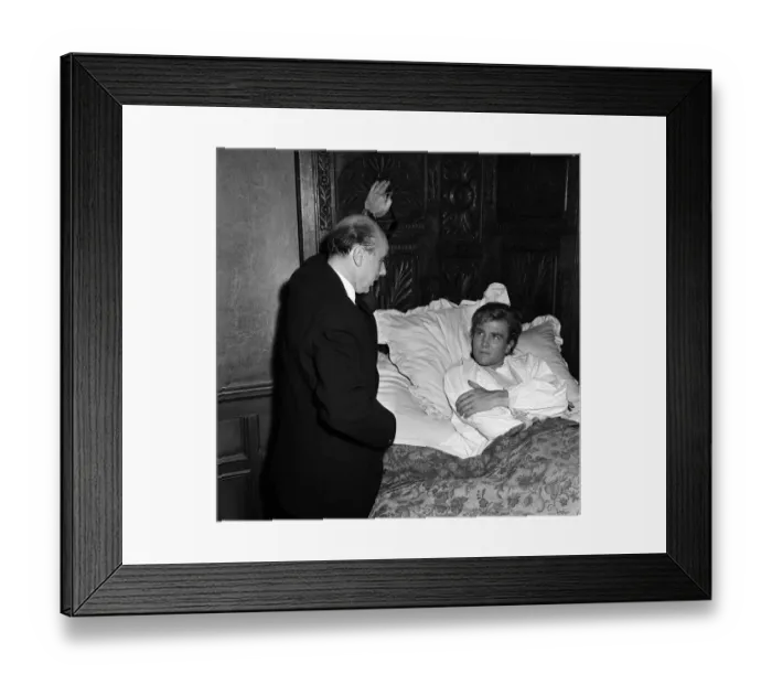 Framed Print : Albert Finney with Donald Zec on the set of Tom Jones'. 24th August 1962 Framed Print : Albert Finney with Donald Zec on the set of Tom Jones'. 24th August 1962