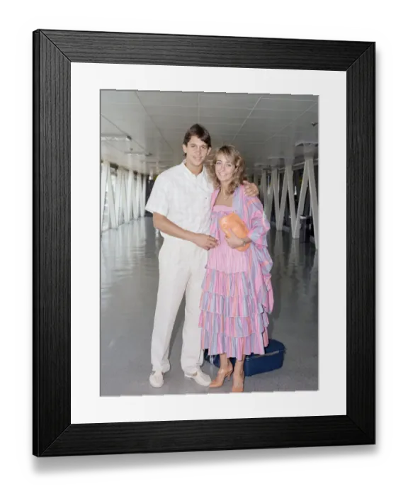 Framed Print : England footballer Gary Lineker with his wife Michelle at London Heathrow