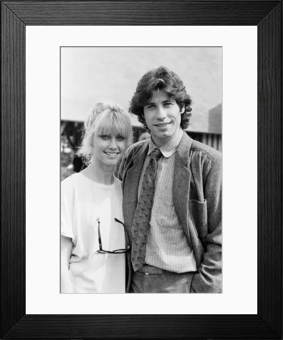 Framed Print : John Travolta and his co star Olivia Newton John in England during the week of release of Framed Print : John Travolta and his co star Olivia Newton John in England during the week of release of