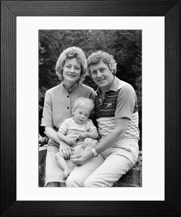 Framed Print : Michael Aspel pictured at home with his wife Lizzie Power and their son. September 1982 Framed Print : Michael Aspel pictured at home with his wife Lizzie Power and their son. September 1982