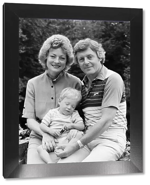 Michael Aspel pictured at home with his wife Lizzie Power and their son. September 1982