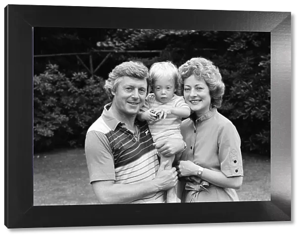 Michael Aspel pictured at home with his wife Lizzie Power and their son. September 1982
