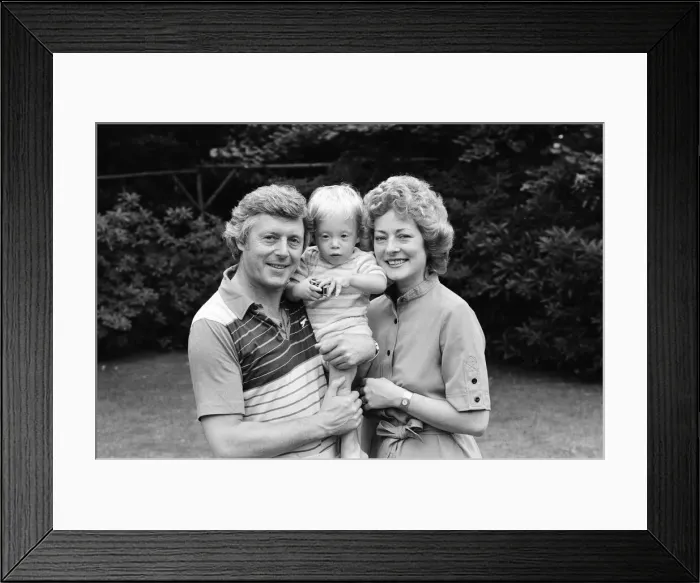 Framed Print : Michael Aspel pictured at home with his wife Lizzie Power and their son. September 1982 Framed Print : Michael Aspel pictured at home with his wife Lizzie Power and their son. September 1982
