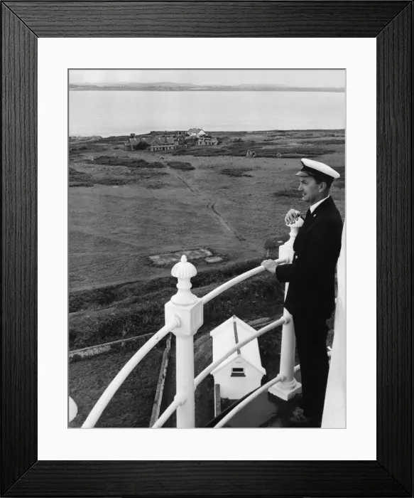 Framed Print : Principal Keeper Colin Nicholls admires the view from the top of the Flat Holm Lighthouse Framed Print : Principal Keeper Colin Nicholls admires the view from the top of the Flat Holm Lighthouse