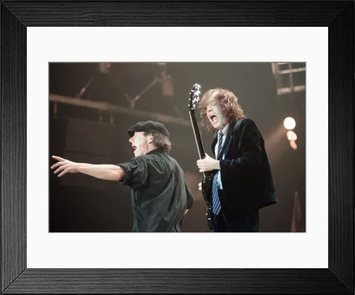 Framed Print : Australian rock group AC / DC performing in concert at the Newcastle Arena during their Framed Print : Australian rock group AC / DC performing in concert at the Newcastle Arena during their