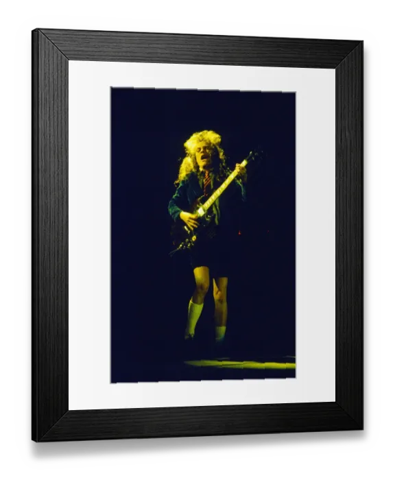 Framed Print : Australian rock group AC / DC performing on stage at Wembley Arena during their Framed Print : Australian rock group AC / DC performing on stage at Wembley Arena during their