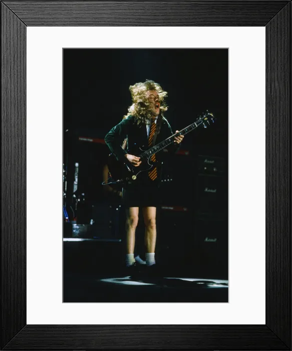 Framed Print : Australian rock group AC / DC performing on stage at Wembley Arena during their Framed Print : Australian rock group AC / DC performing on stage at Wembley Arena during their
