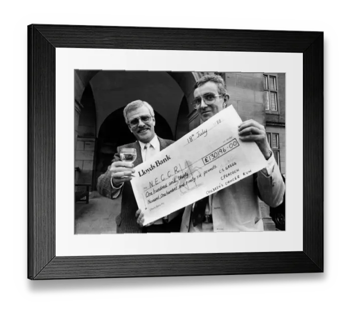 Framed Print : Charity fun runners were the toast of the hospital as they handed over a cheque for more