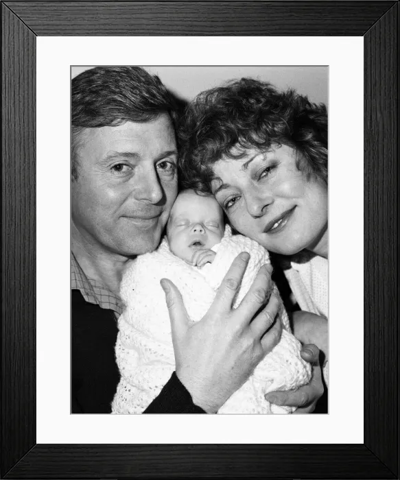 Framed Print : Michael Aspel and his wife Lizzie Power with their newborn son, Patrick