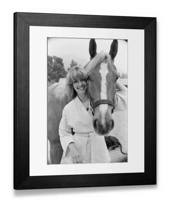 Framed Print : Olivia Newton John, singer and actor, pictured at home in Malibu, California, America Framed Print : Olivia Newton John, singer and actor, pictured at home in Malibu, California, America