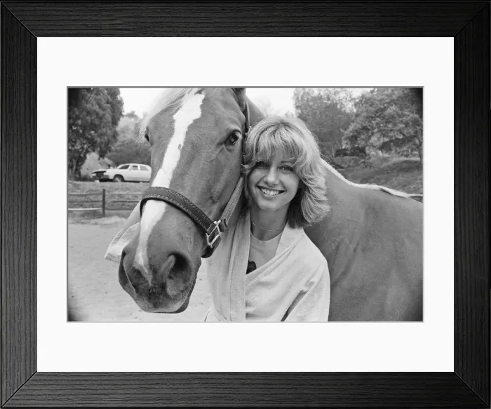 Framed Print : Olivia Newton John, singer and actor, pictured at home in Malibu, California, America Framed Print : Olivia Newton John, singer and actor, pictured at home in Malibu, California, America