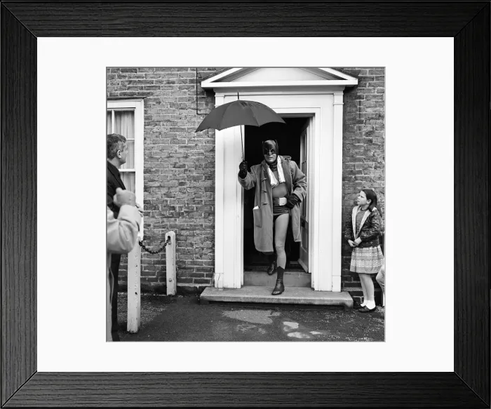 Framed Print : Adam West as Batman helps out with road safety campaign in London which is being