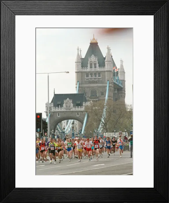 Framed Print : The London Marathon, 1991. Runners passing through and around Tower Bridge Framed Print : The London Marathon, 1991. Runners passing through and around Tower Bridge