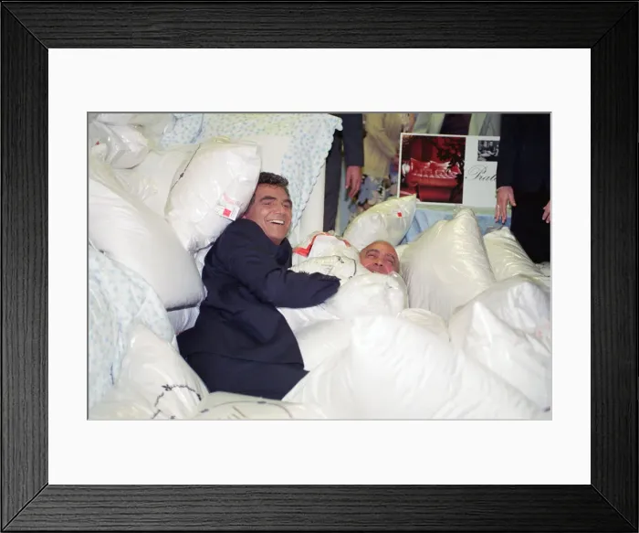 Framed Print : American actor Burt Reynolds opening the Harrods Sale. Pictured with Harrods owner Framed Print : American actor Burt Reynolds opening the Harrods Sale. Pictured with Harrods owner