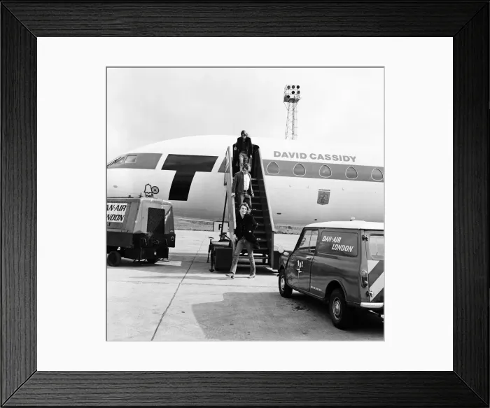 Framed Print : David Cassidy, singer, actor and musician, arrives at Luton Airport to start his Framed Print : David Cassidy, singer, actor and musician, arrives at Luton Airport to start his