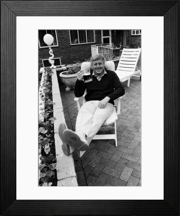 Framed Print : Michael Aspel relaxes at home. 31st May 1988 Framed Print : Michael Aspel relaxes at home. 31st May 1988