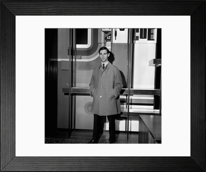Framed Print : A man modelling an overcoat. 24th August 1965 Framed Print : A man modelling an overcoat. 24th August 1965