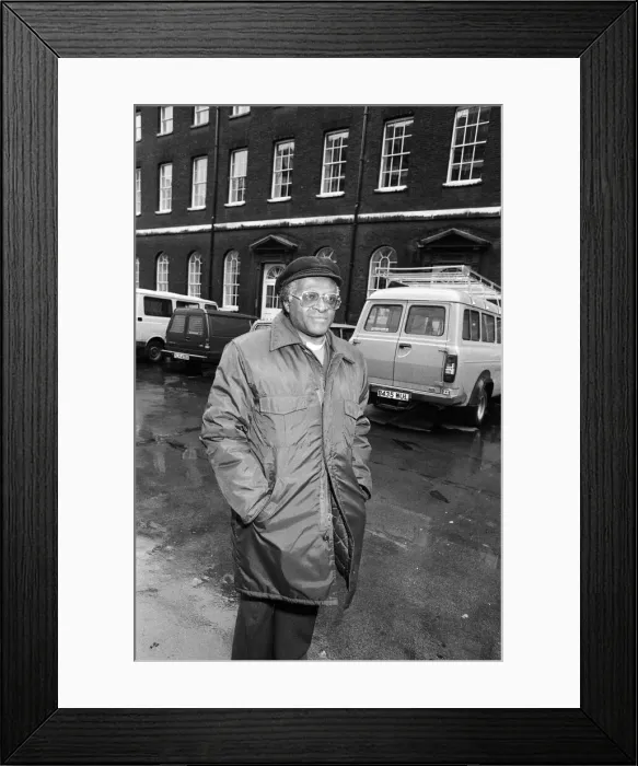 Framed Print : Bishop Desmond Tutu arriving at Kings College for a press conference Framed Print : Bishop Desmond Tutu arriving at Kings College for a press conference