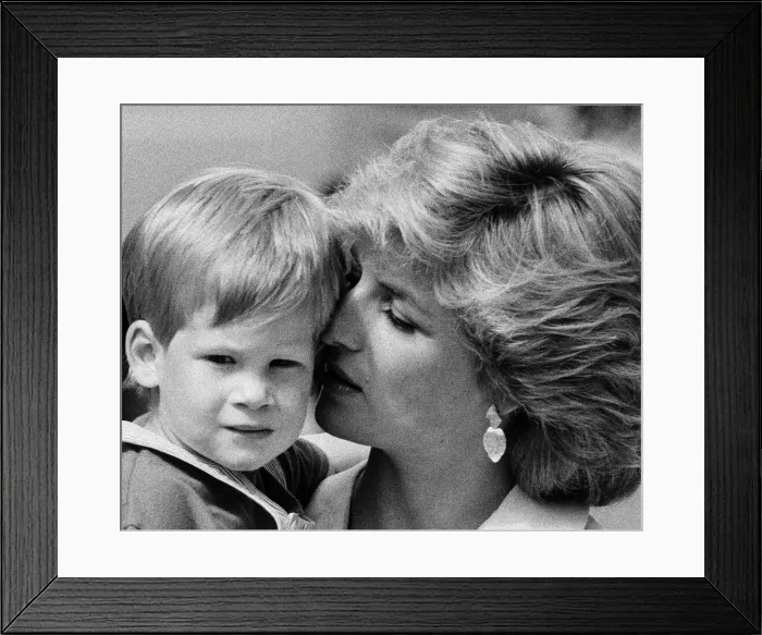 Framed Print : Princess of Wales holds her young son Prince Harry on holiday in Majorca, Spain Framed Print : Princess of Wales holds her young son Prince Harry on holiday in Majorca, Spain