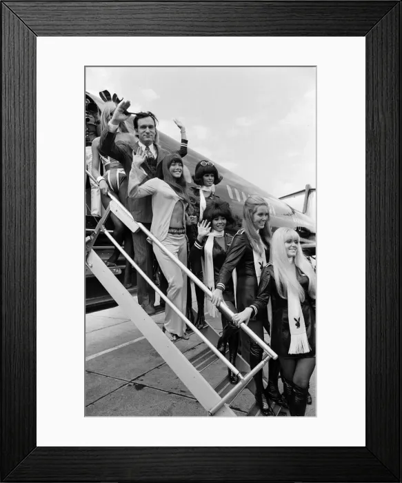 Framed Print : Playboy Editor and Publisher Hugh Hefner arrives at Heathrow Airport in his private Framed Print : Playboy Editor and Publisher Hugh Hefner arrives at Heathrow Airport in his private