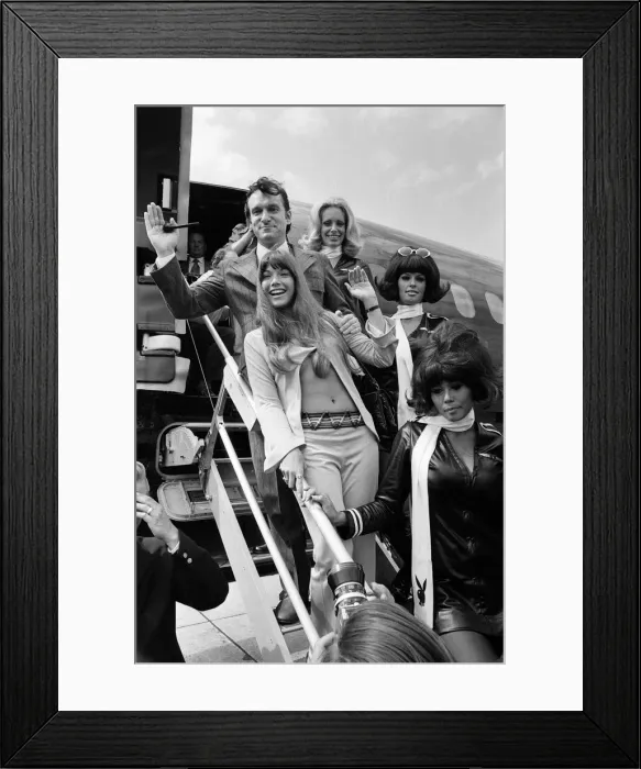 Framed Print : Playboy Editor and Publisher Hugh Hefner arrives at Heathrow Airport in his private Framed Print : Playboy Editor and Publisher Hugh Hefner arrives at Heathrow Airport in his private