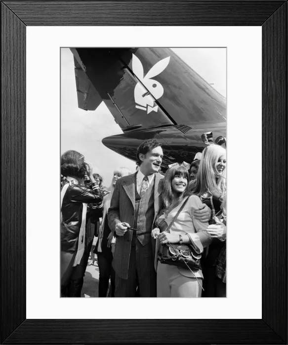 Framed Print : Playboy Editor and Publisher Hugh Hefner arrives at Heathrow Airport in his private Framed Print : Playboy Editor and Publisher Hugh Hefner arrives at Heathrow Airport in his private