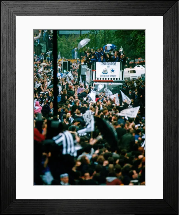 Framed Print : Newcastle United win the First Division. Players on the open top bus wave to fans during