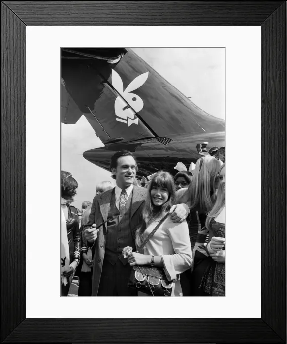 Framed Print : Playboy Editor and Publisher Hugh Hefner arrives at Heathrow Airport in his private Framed Print : Playboy Editor and Publisher Hugh Hefner arrives at Heathrow Airport in his private