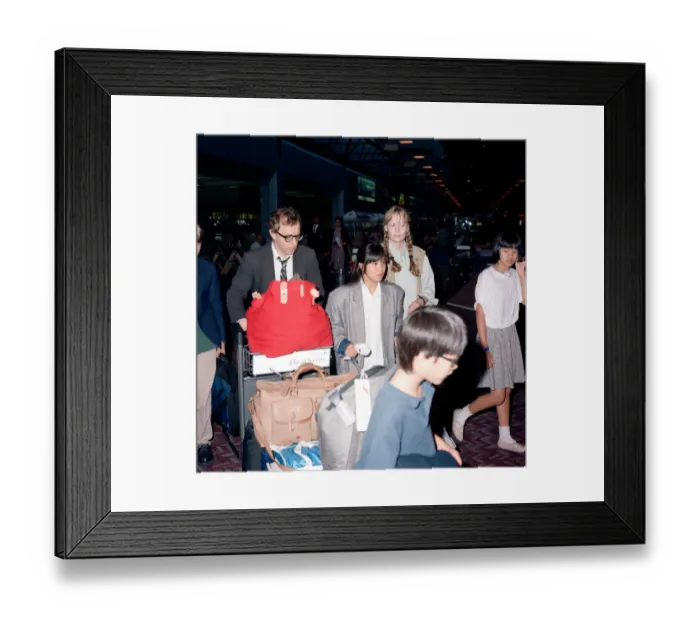 Framed Print : Woody Allen and his partner, actress Mia Farrow, with some of their children at London Framed Print : Woody Allen and his partner, actress Mia Farrow, with some of their children at London