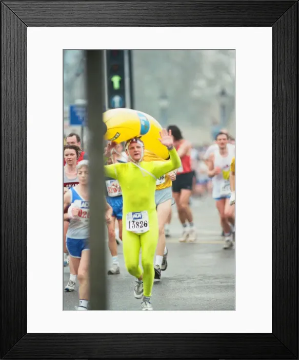Framed Print : The London Marathon - 1990 Runners pass through and around the Tower Bridge area Framed Print : The London Marathon - 1990 Runners pass through and around the Tower Bridge area