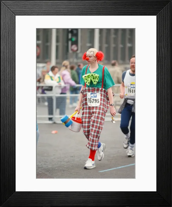 Framed Print : The London Marathon - 1990 Runners pass through and around the Tower Bridge area Framed Print : The London Marathon - 1990 Runners pass through and around the Tower Bridge area