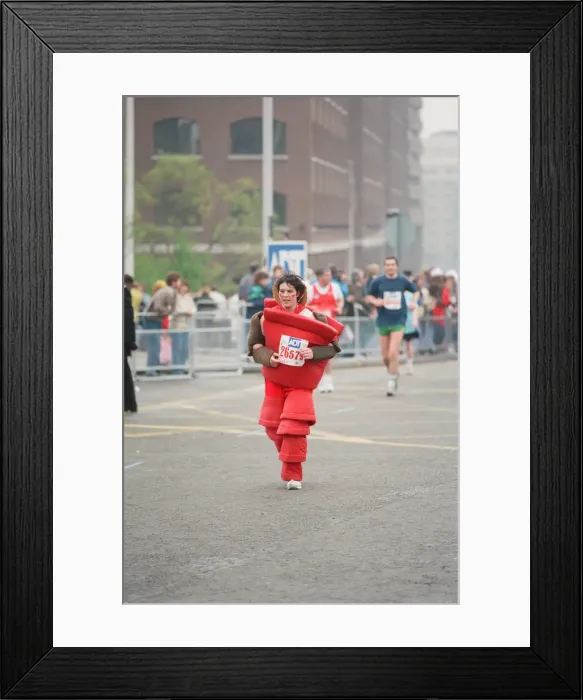 Framed Print : The London Marathon - 1990 Runners pass through and around the Tower Bridge area Framed Print : The London Marathon - 1990 Runners pass through and around the Tower Bridge area