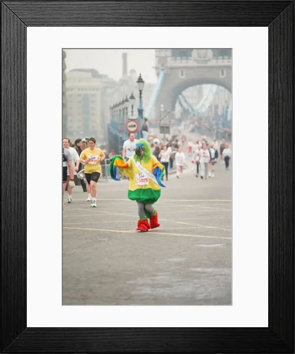 Framed Print : The London Marathon - 1990 Runners pass through and around the Tower Bridge area Framed Print : The London Marathon - 1990 Runners pass through and around the Tower Bridge area