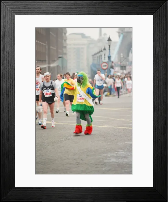 Framed Print : The London Marathon - 1990 Runners pass through and around the Tower Bridge area Framed Print : The London Marathon - 1990 Runners pass through and around the Tower Bridge area